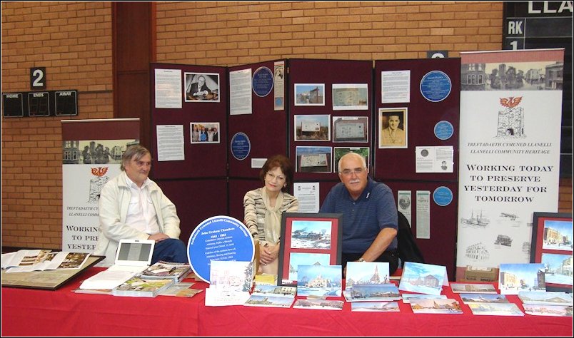 Llanelli Festival 2012 - Llanelli Community Heritage stand (L-R) Hugh Lewis (treasurer) Caroline Streek (secretary) Gwyn Daniel (fundraiser)